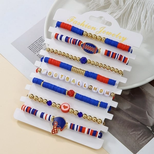 Detail of Football Mom layered bracelet set with red blue clay beads and sports charms