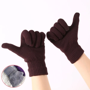 Solid color warm winter knitted gloves in dark brown with elastic ribbed cuffs