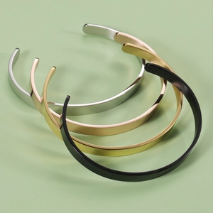 Detailed top view of 6mm wide open C-shaped bracelets in silver, gold, rose gold, and black