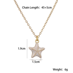 Détails de la chaîne 45+5cm et du pendentif étoile de mer ivoire de 1,9cm
