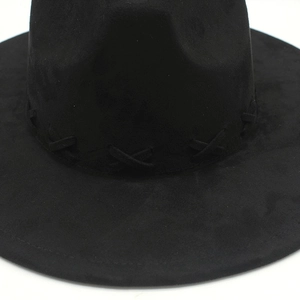Detail of black suede fedora featuring a criss-cross woven leather band decoration