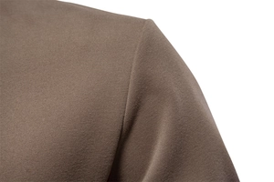 Close-up of the stitching and breathable fabric texture on a khaki men sweatshirt