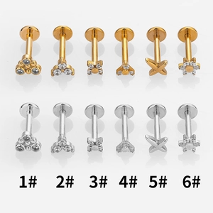 Set of 12 stainless steel labret studs with zircon cross and heart designs in gold and silver