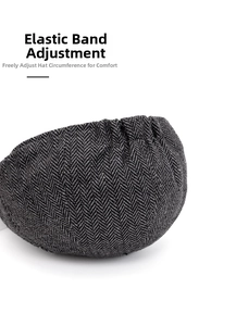 Detail of adjustable elastic band on newsboy hat with grey herringbone tweed texture