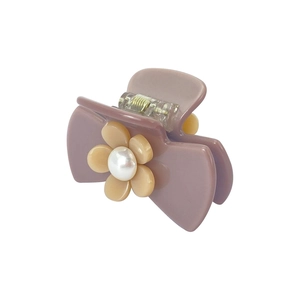 Elegant purple acrylic camellia hair claw clip with cream flower and white pearl decoration