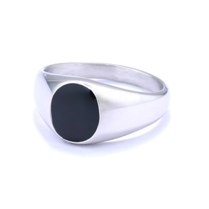 Detail view of the silver stainless steel signet ring featuring a black oval face inlay
