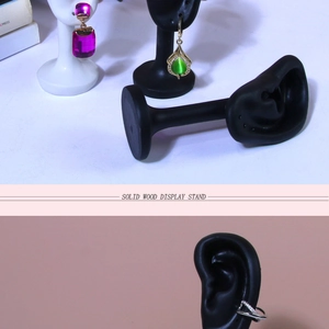 Black and white solid wood earring display stands in bionic ear shape for jewelry
