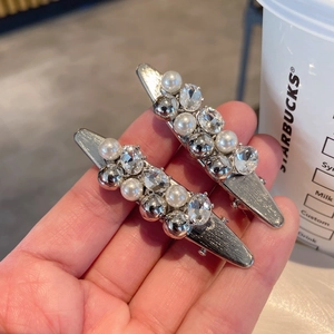 Elegant silver metal bow hair clips with clear crystals and white pearls for women