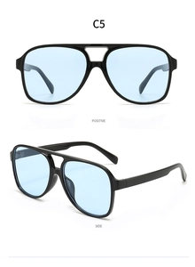 Detail view of C5 oversized retro double bridge sunglasses with black frame and blue lenses