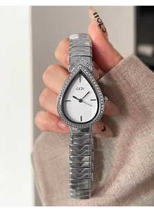 Close-up of GEDI silver pear-shaped watch with crystal bezel and wavy metal bracelet