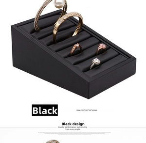 Detail view of black PU leather jewelry display stand for rings and bracelets, size 150x105mm