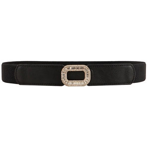 Elastic black waist belt with a golden square buckle and clear rhinestones on white background