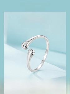 Close-up detail of S925 sterling silver stamp on the cute cat paw embrace ring