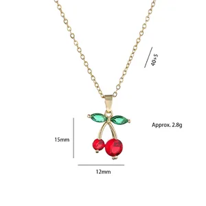 Titanium steel cherry necklace with red beads and green leaf crystals on gold chain