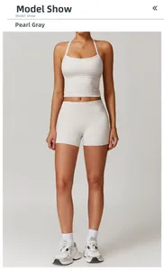 Front view of pearl grey brushed yoga tank top and high waist shorts on a model