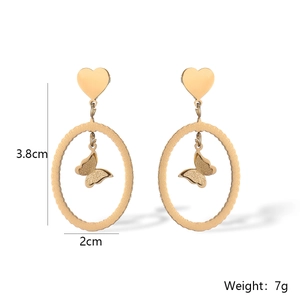 Detail view of butterfly heart earrings with dimensions 3.8cm height and 2cm width