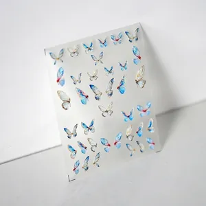 3D embossed blue and gold butterfly nail art stickers with elegant script details