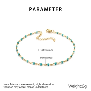 Macro detail of turquoise beads on a golden stainless steel anklet with sizing specs