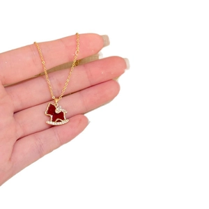 18K gold plated necklace with a red and gold rocking horse pendant inlaid with zircons
