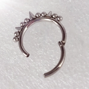 316L stainless steel hinged segment ring with alternating beads and pointed spikes