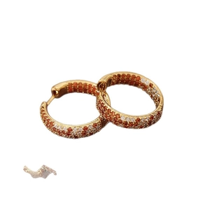 Retro round gold hoop earrings with pavé set orange and white zircon stones
