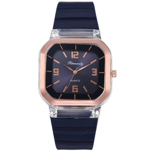 Detail of square quartz watch featuring navy blue dial and rose gold finish bezel