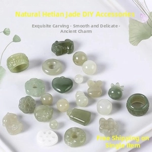 Detailed assortment of handcrafted Nephrite Jade charms including hearts and lotus shapes