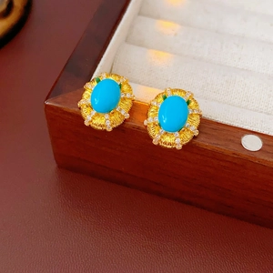 Orecchini vintage in oro con pietra turchese ovale e aureola di diamanti brillanti