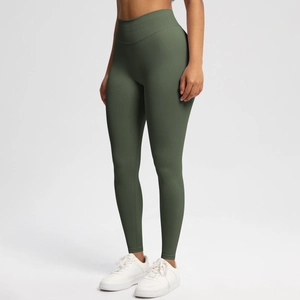 Detail of high-waist olive green seamless yoga leggings with peach butt lifting effect