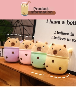Detail of four colorful capybara plush toys in milk tea cups on a wooden shelf