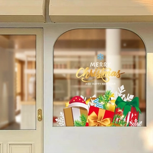 Festive Christmas window stickers with red gift boxes and Merry Christmas gold lettering