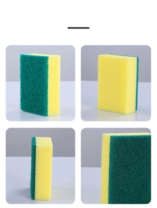 Close-up of double-sided kitchen sponge with green scouring pad and yellow sponge layer