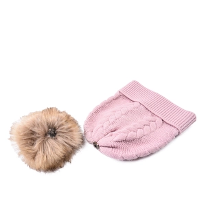 Close-up of pink cable knit hat with detachable faux fur pom-pom and metal snap