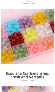Macro shot of 8x6mm colorful glass barrel beads stored in a transparent organizer box