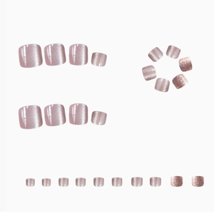 Set of 24 pink cat-eye and glitter press-on toenails on a clean white background