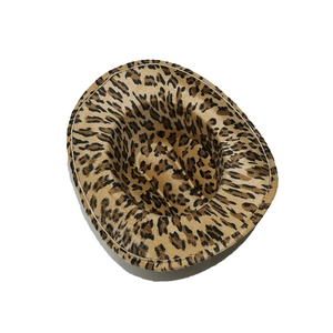 Detailed view of leopard print cowboy hat with distinct white stitching on brim
