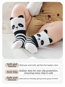 Detail of baby panda socks featuring anti-slip grips on soles and soft striped knit fabric