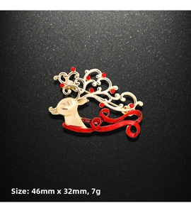 Detailed view of reindeer brooch with red rhinestones and 46mm x 32mm dimensions