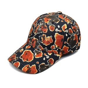 Unisex tie-dye baseball cap in orange and black with a classic curved brim for sun protection