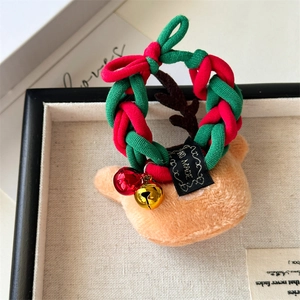 Christmas hair scrunchie with plush elk decor, red and green woven rope and small bells