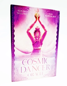 Detailed view of Cosmic Dancer Oracle deck featuring vibrant purple cover art