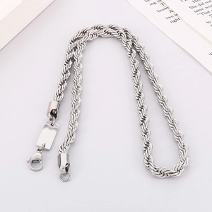 Detailed view of a silver twisted rope chain necklace with a lobster clasp closure