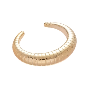 Polished gold croissant cuff bracelet with textured ribbed surface for women