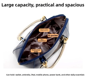 Interior layout of patent leather boston bag showing pockets and large storage space
