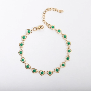 Detailed top view of 18k gold-plated bracelet with elegant green heart-shaped charms