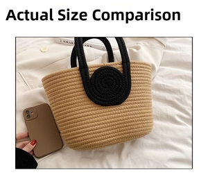 Detail of woven cotton tote bag in khaki with black handles and round pattern
