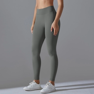 Detailed close-up of high-waist seamless compression yoga leggings in dark grey