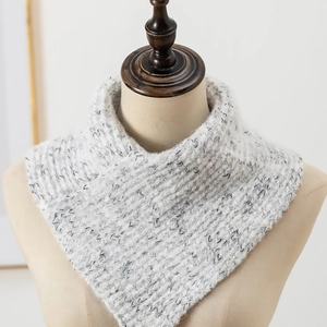 Light gray knitted scarf for winter featuring thick soft texture on mannequin
