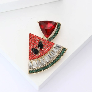 Sparkling watermelon slice brooch with colorful rhinestones on a gold alloy base