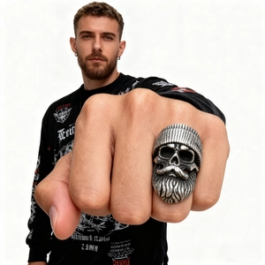 Retro stainless steel biker ring featuring a bearded skull with beanie on hand